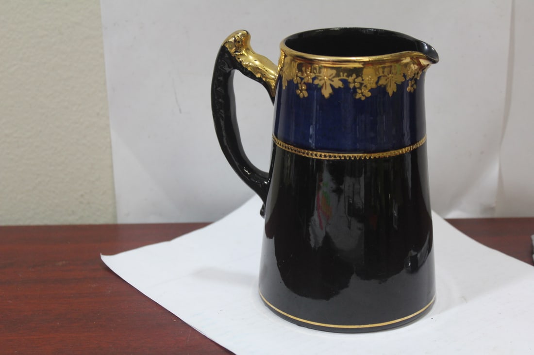 An Antique Pottery Pitcher: 6 1/8" tall