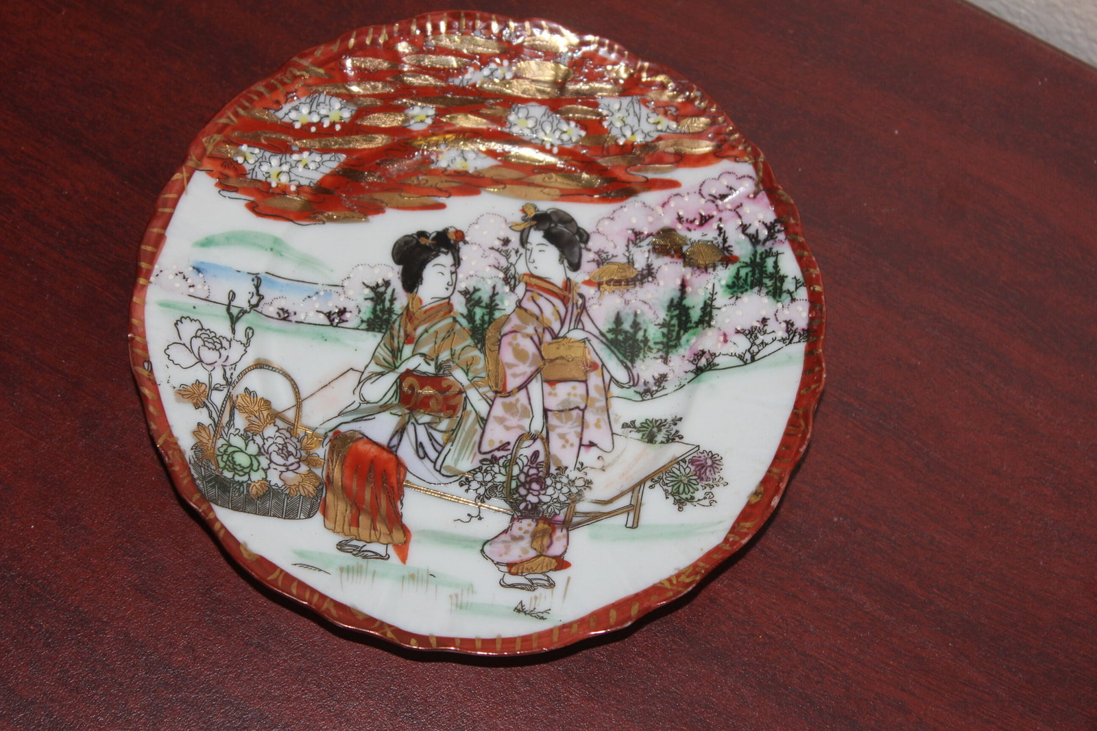 A Japanese Kutani Bread Plate: signed - 6 1/4" in diameter