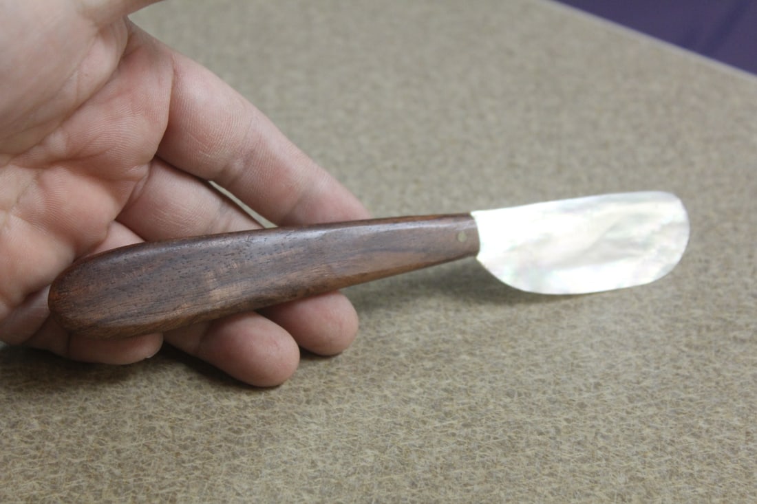 Mother of Pearl and Wooden butter knife(?) (1 of 2)