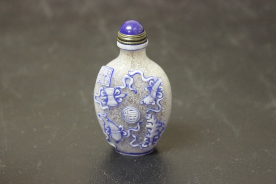 A Chinese Peking Glass Overlay Snuff Bottle (1 of 3)