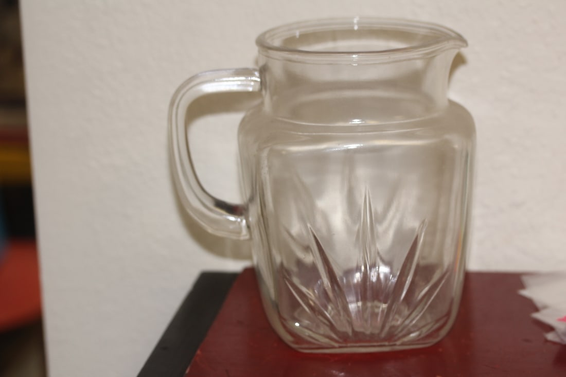 Antique Clear Glass Pitcher: 7" tall by 7" wide - including the handle
