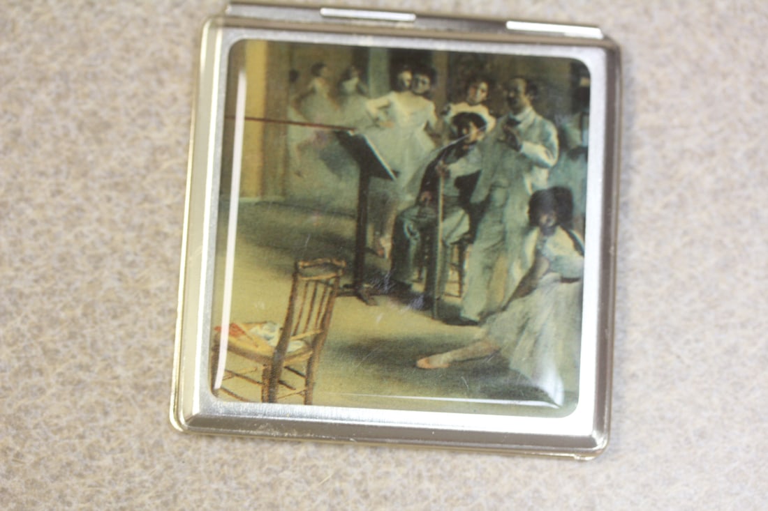 A Compact Duel Mirror: 2 3/4" square