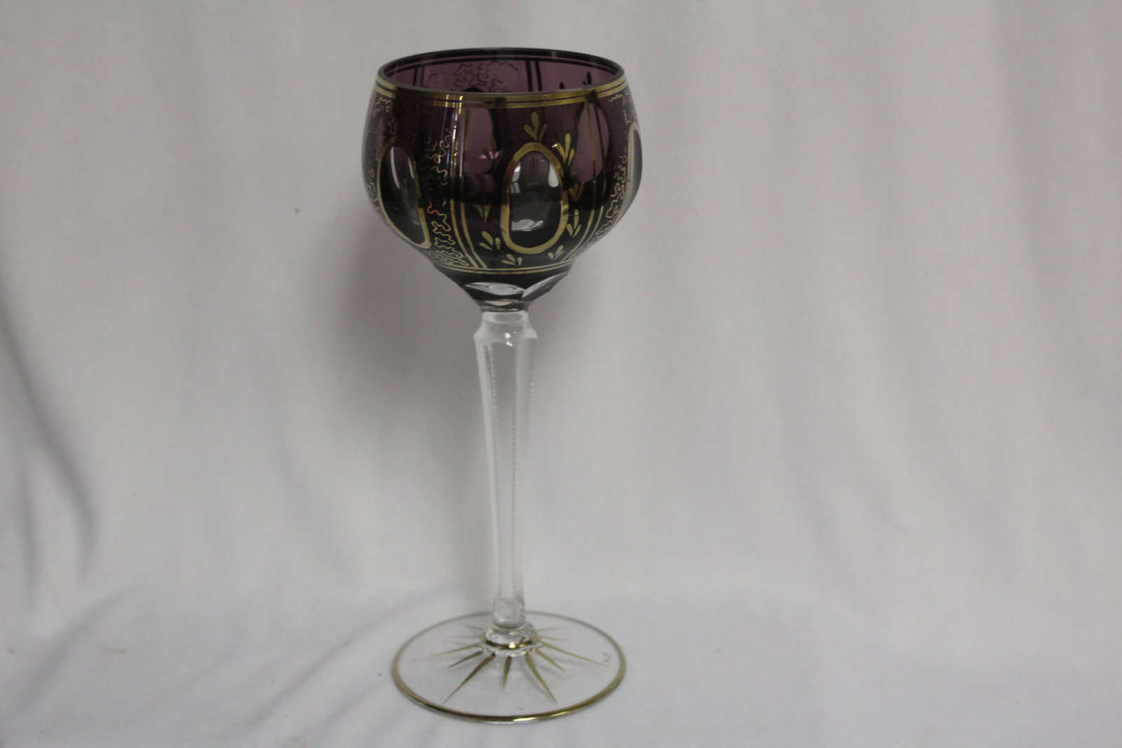 A Cut Glass Amethyst Color Goblet: 8 3/8" tall