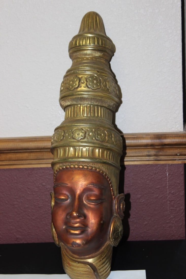 A Decorative Wall Hanger: 19 inches tall