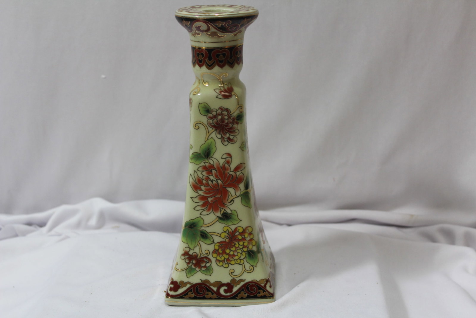 A Single Ceramic Candlestick: 8 3/4" tall