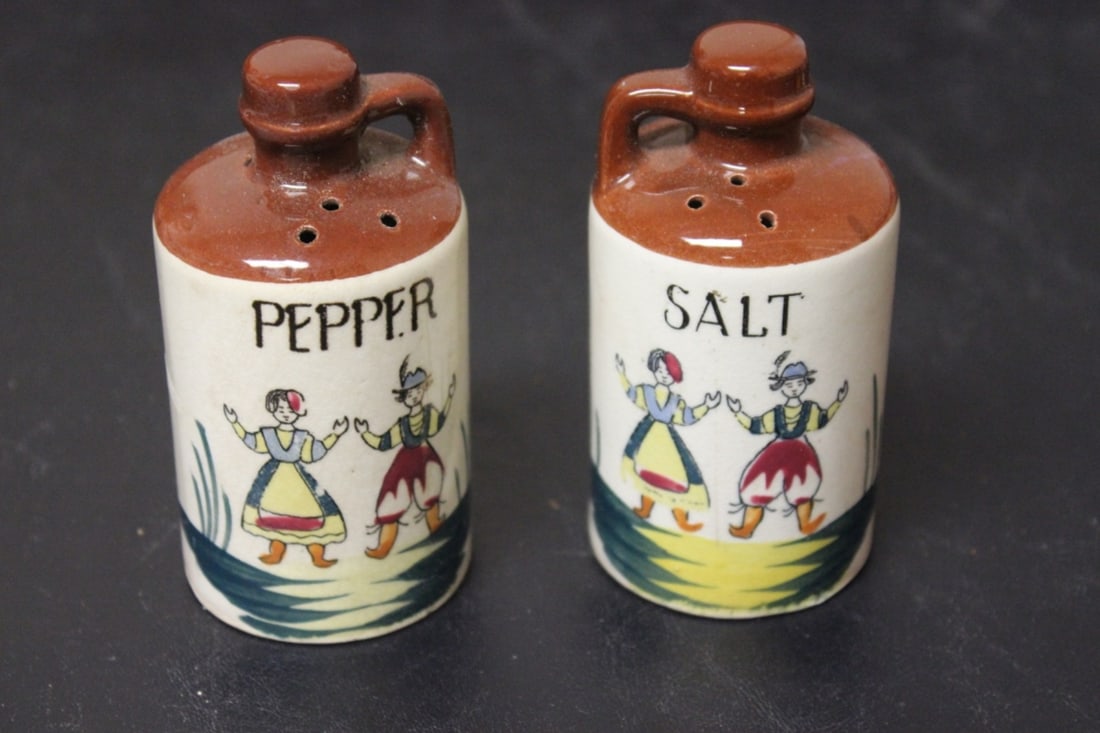 A Lot of Two Salt and Pepper Shakers: each 4" tall