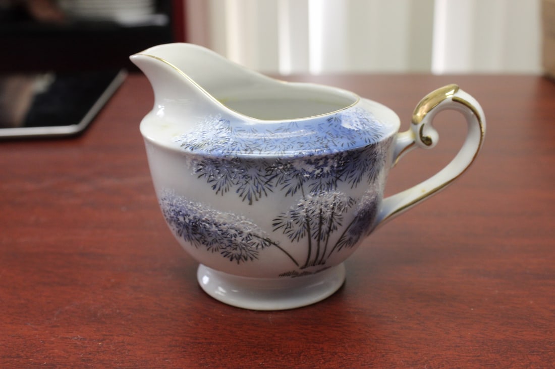 A Japanese Kutani Creamer: 5 3/8" wide