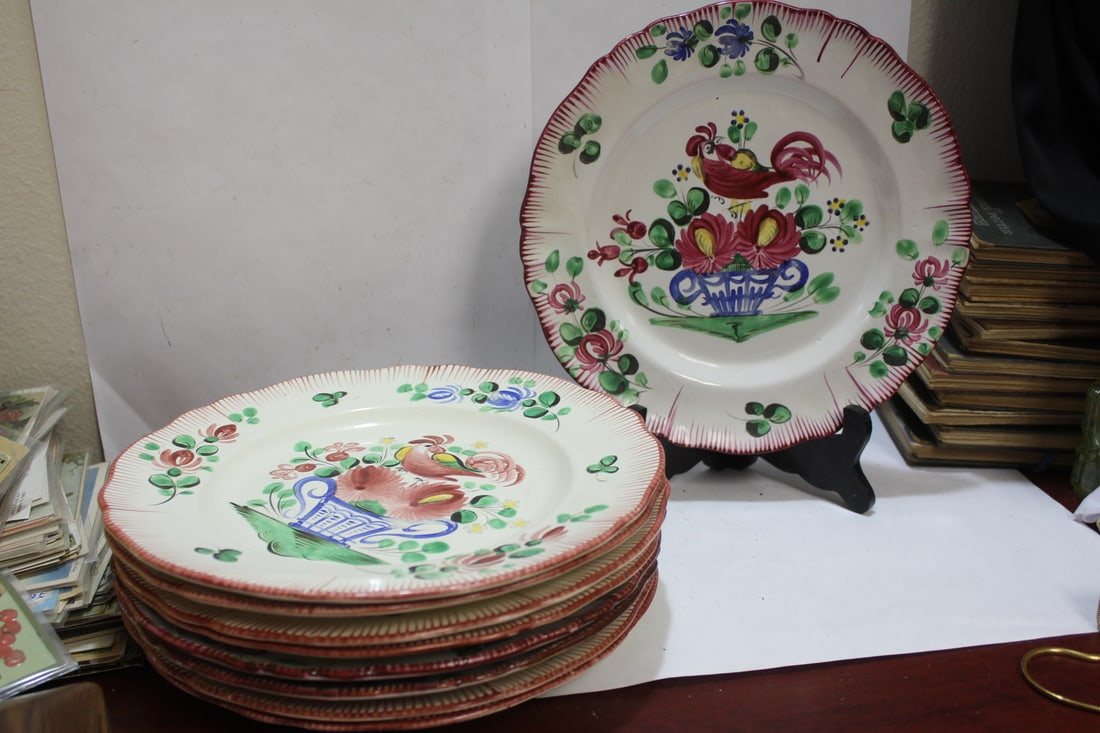 Lot of 9 Rooster Pottery Plates: marked "France" - please note: a couple of them is worn - 10 inches in diameter each
