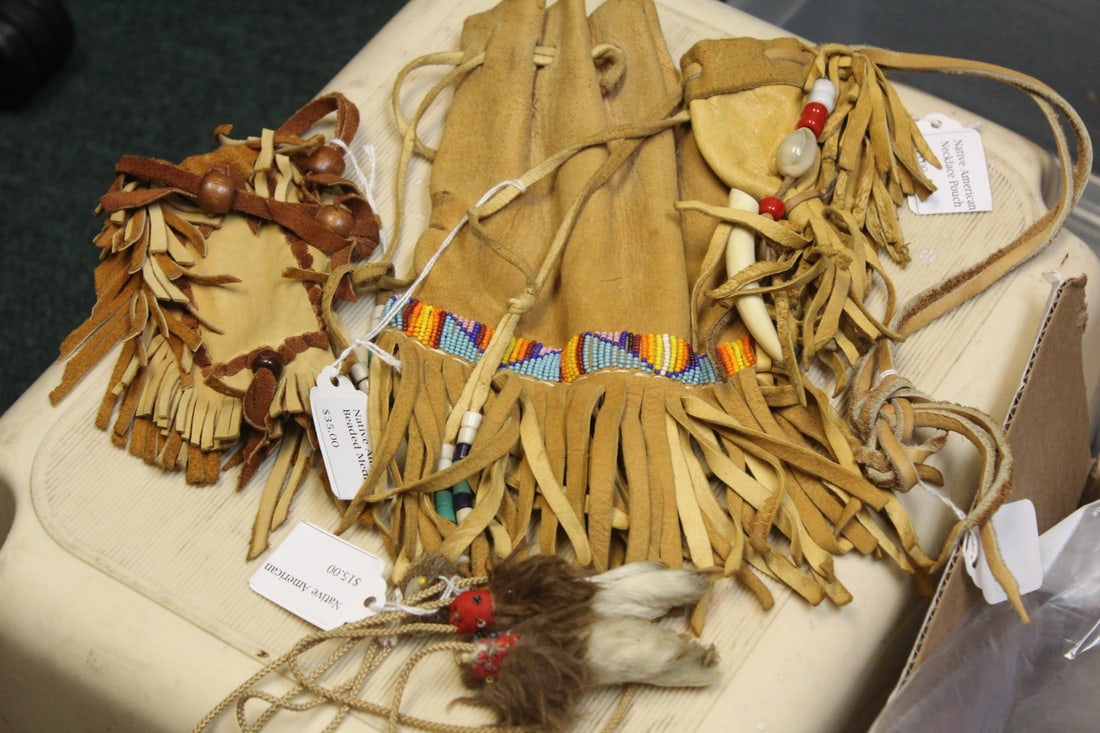 Lot of 4 Native American Articles: to include 3 leather bag or pouch and a couple of claws
