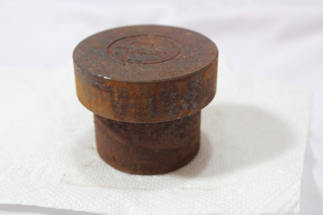 A Solid Cast Iron Mold?Stamp?: very heavy - 2 1/8" tall