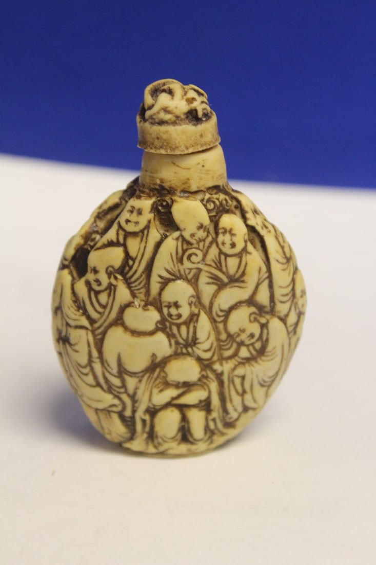 A Carved Resin Snuff Bottle: 3 1/4" tall