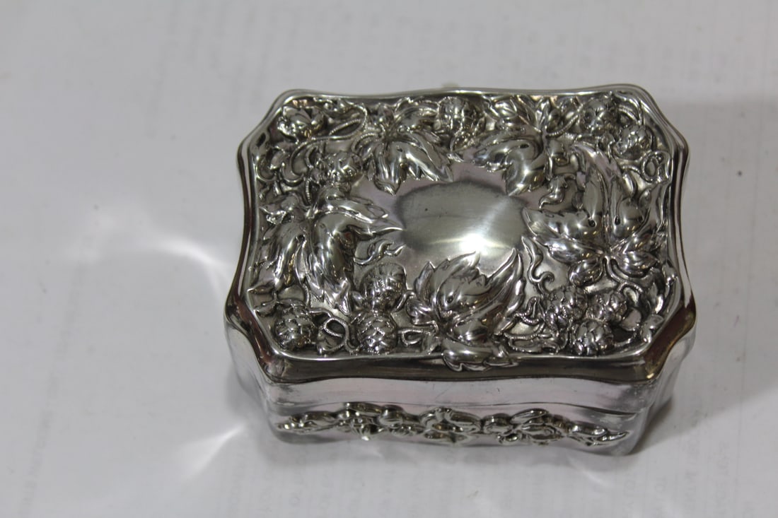 A Repousse Silverplated Box: 4 inches a cross - very ornate
