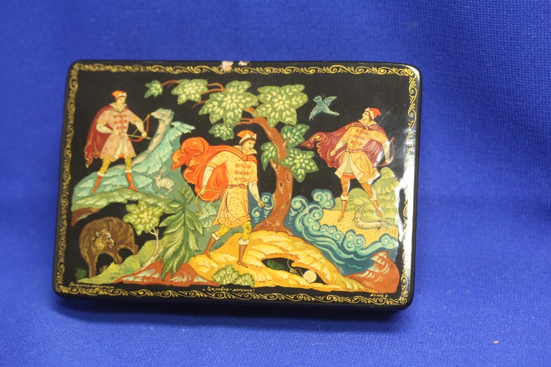 A Hand Painted Russian Lacquer Box: signed - please note: small losses on top as shown - nicely designed - 5 1/4" across