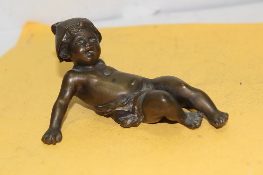 A Signed Solid Bronze Baby Figure: antique, most likely 19th century - 4" across