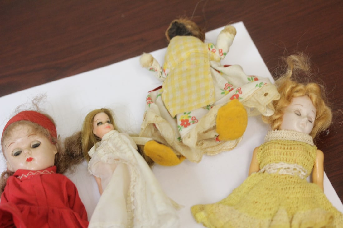 Lot of 4 Vintage Dolls: couple of them well jointed - one black one - tallest= approximately 8 inches - one is signed