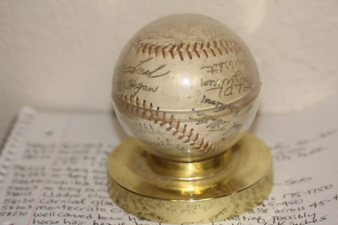 Plate Signed Baseball: by a group of a team - please note: these are not hand signed