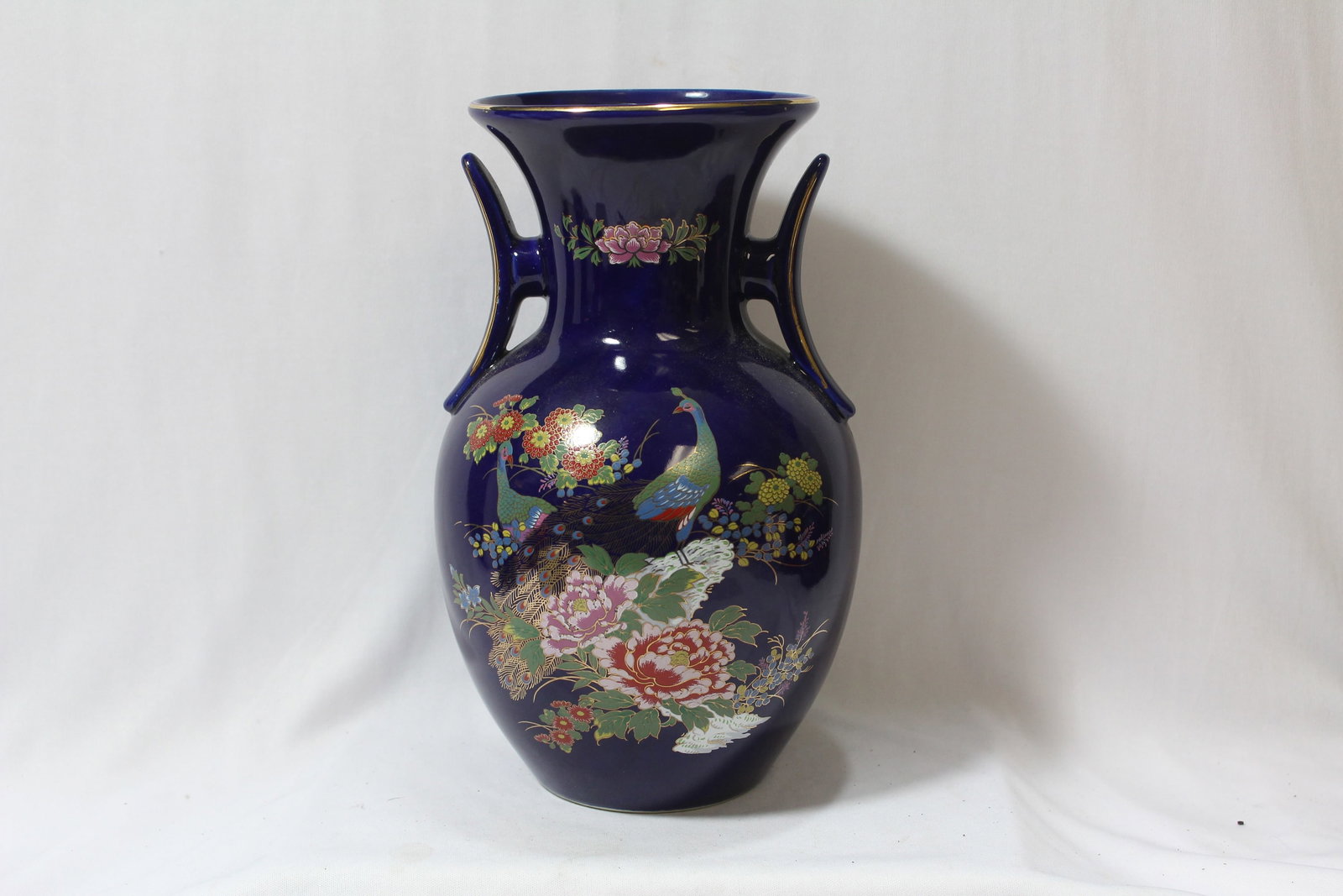 An Oriental Porcelain Vase: 10 3/8" tall