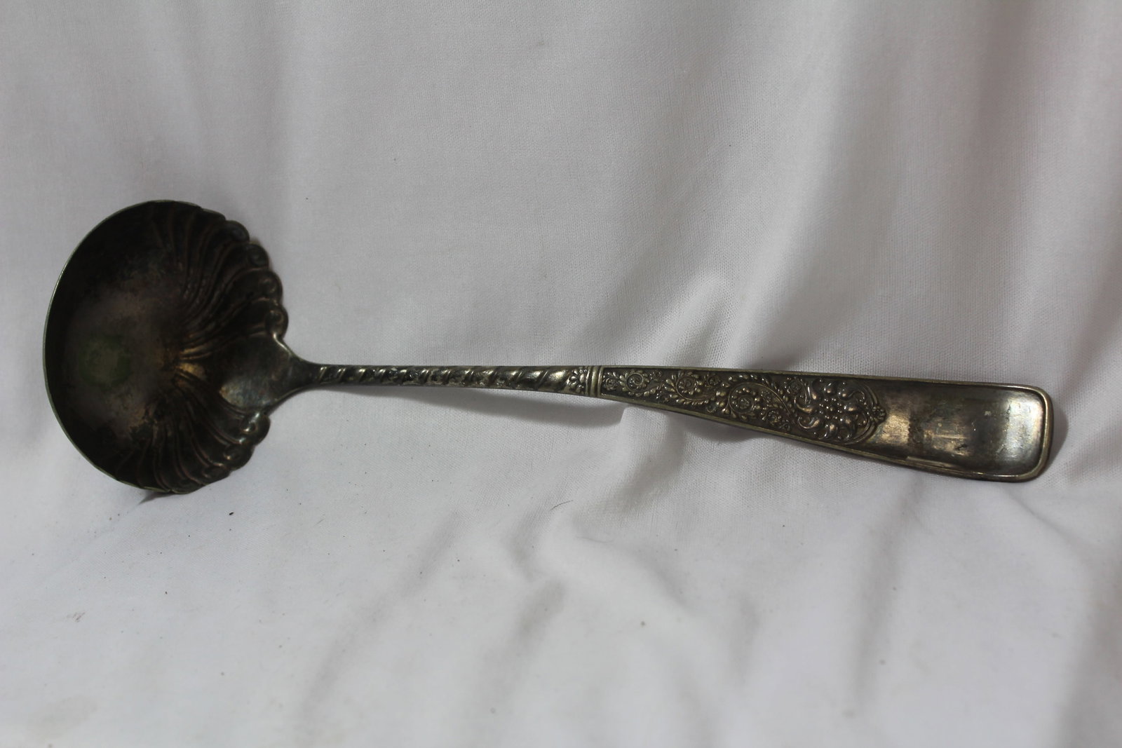 A Silverplated Ladle: Needs cleaning - 10 1/2" long