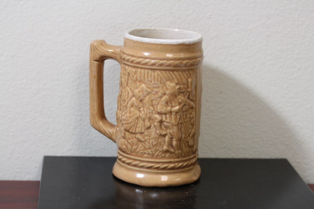 A Ceramic Mug or Stein: looks to be old - with the numbers 327 on the bottom - 5 3/4" tall