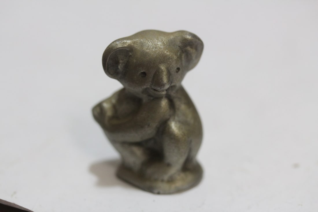 A Miniature Pewter Bear: 1 1/2" tall