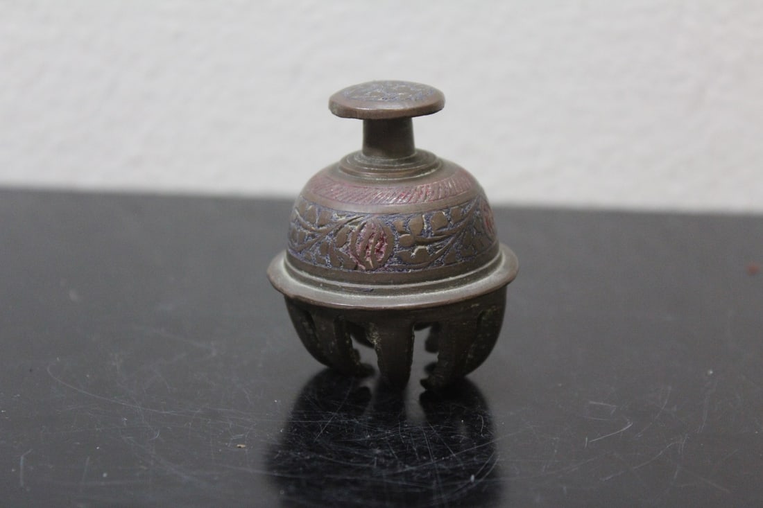 A Small Oriental Bell: 2 1/8" brass or bronze construction