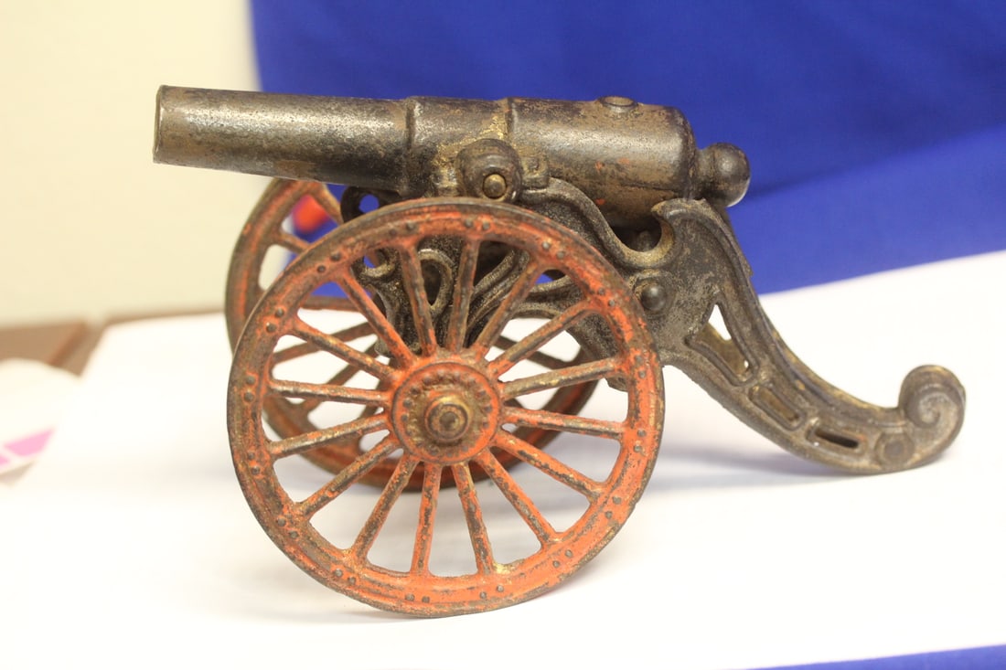 A Vintage Cast Iron Cannon: 7 1/8" across