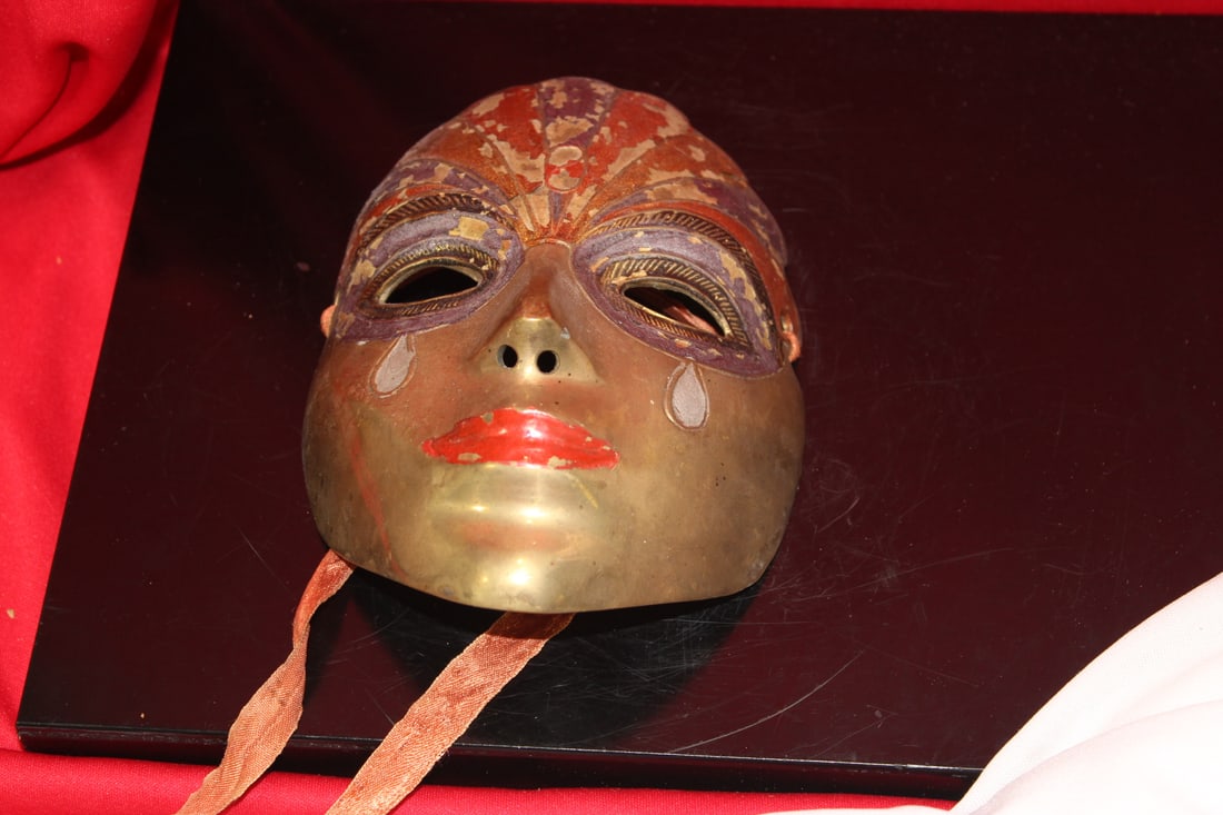 A Metal Mask: 6" across
