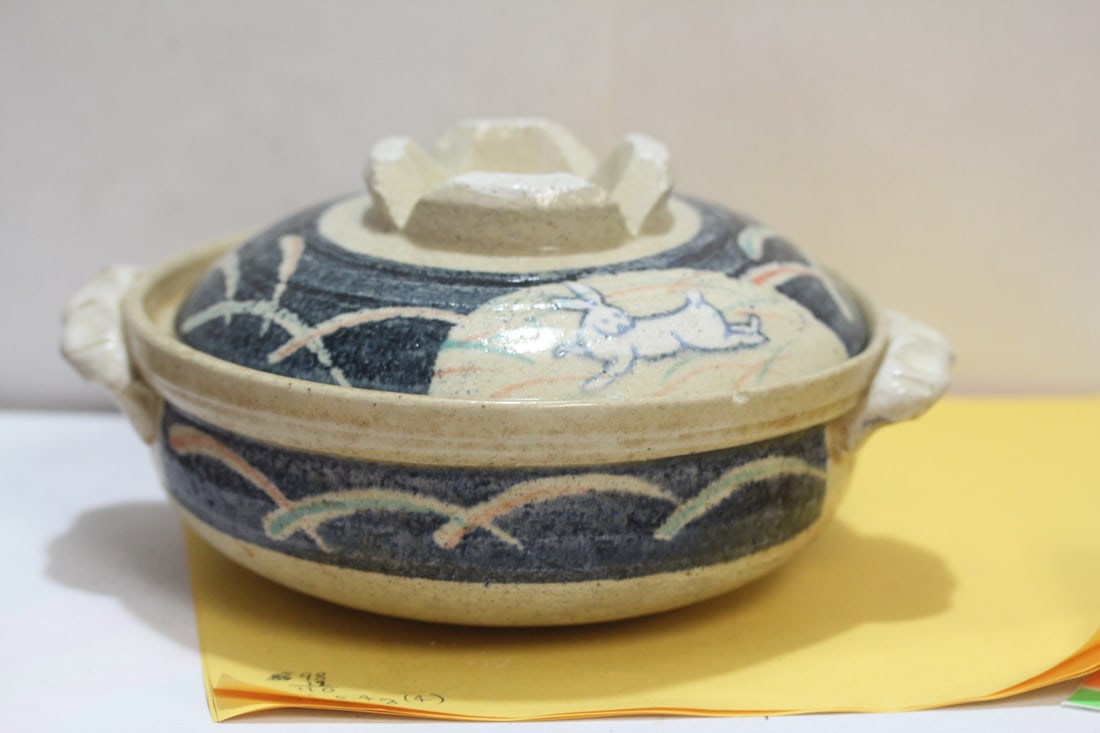 An Oriental Clay Pot: most likely Japanese - please note: one tiny chip as shown - handle to handle 8 1/4" across