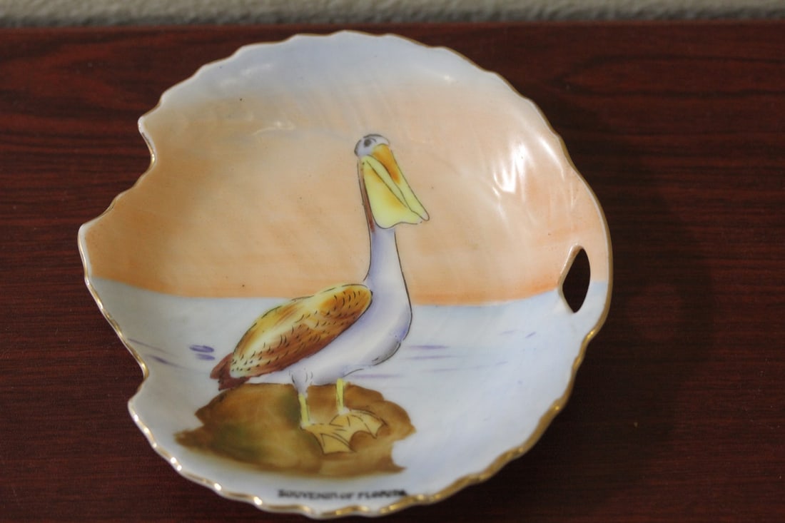 A Florida Souvenir Plate: Pelican motif - unusual design - 4 7/8" across