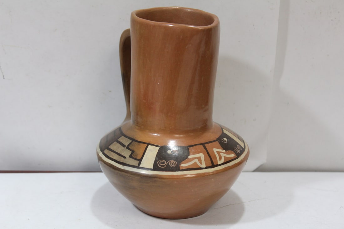 An Art Pottery Pitcher: signed - most likely Mexican - 6 1/4" tall