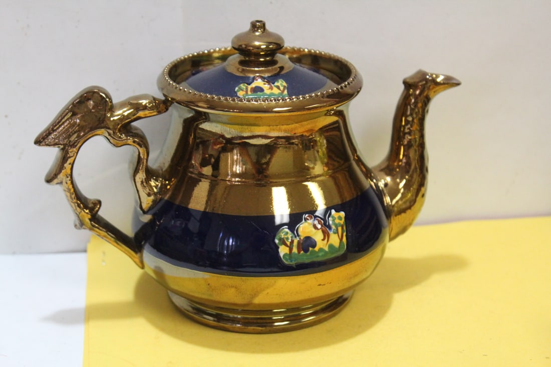 A Ceramic Lusterware Teapot: 6 1/4" tall