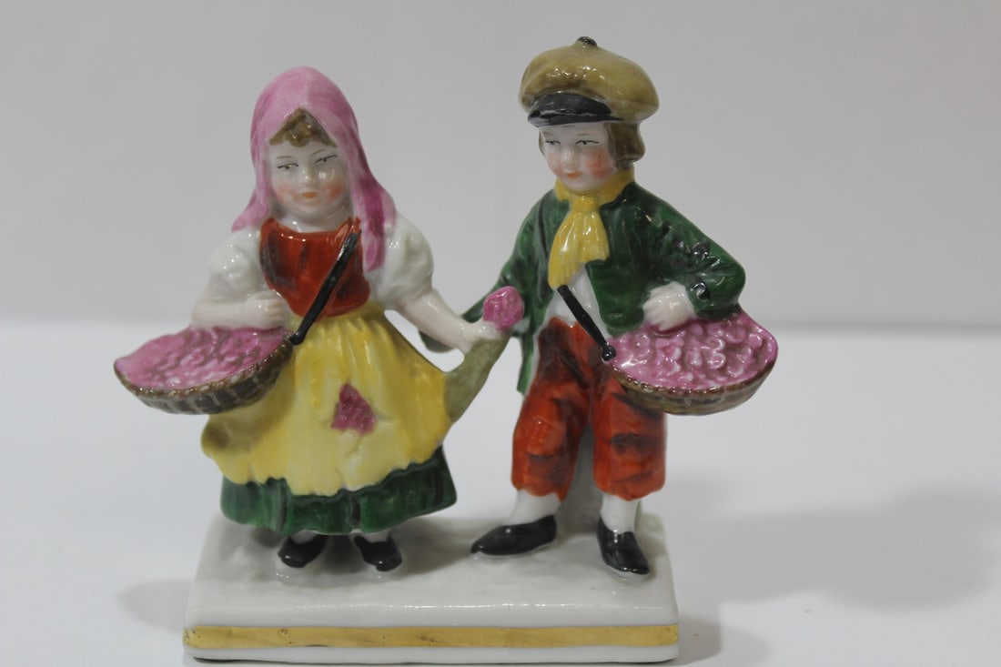 An Antique Dresden Figurine: 4" across