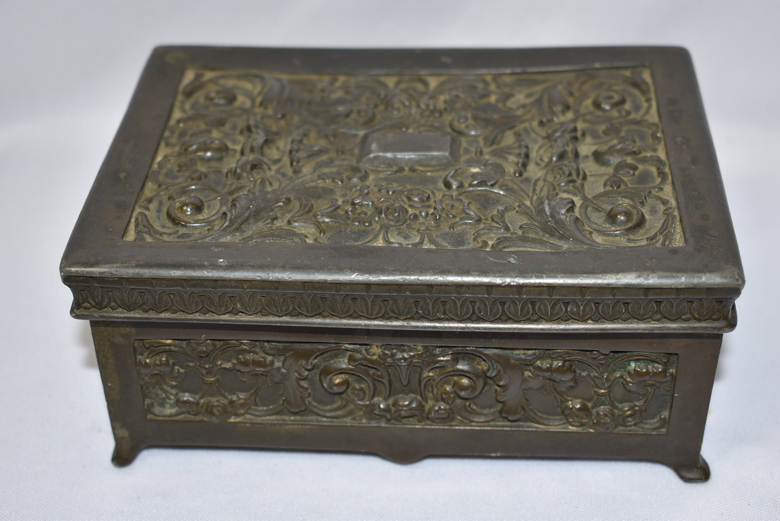 A Repousse Metal Box: 5 3/4" x 4" x 2 1/2"