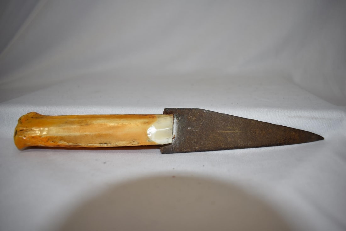 A Bone Handle Knife: 8" across