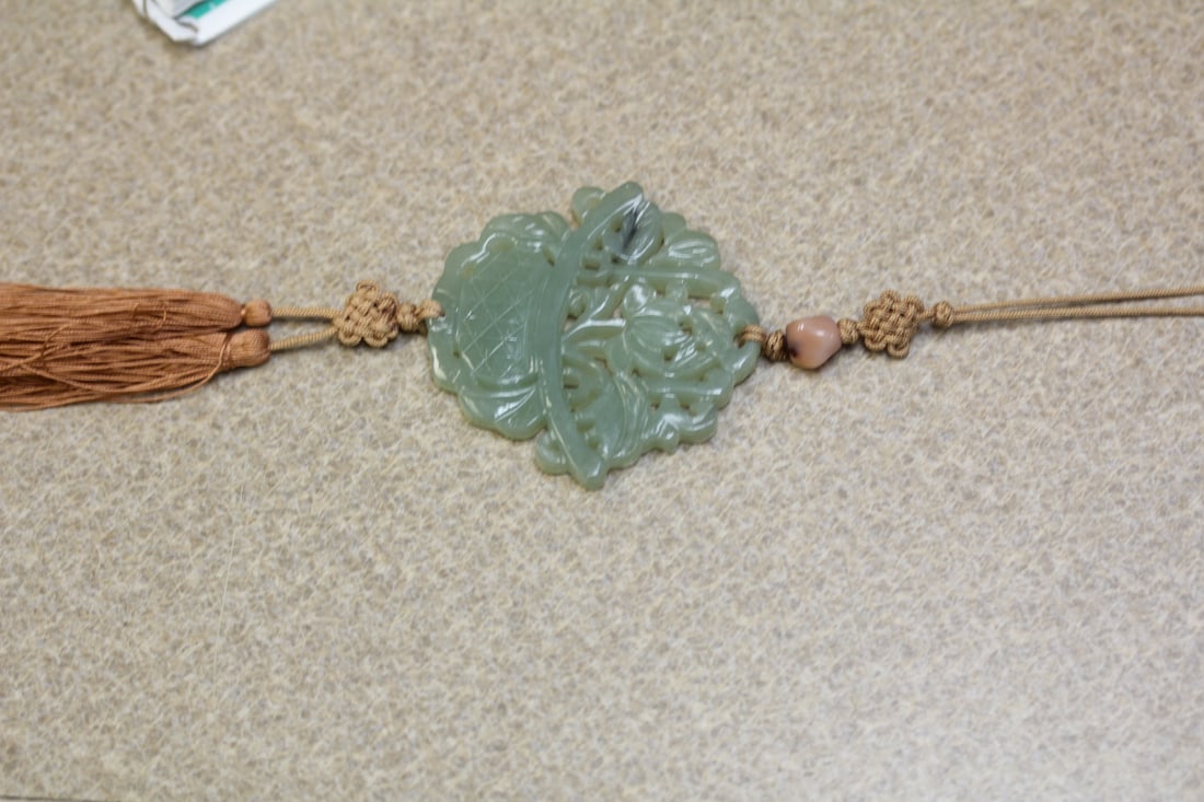 Jadeite Pendant: overall= 9 1/4" long approximately