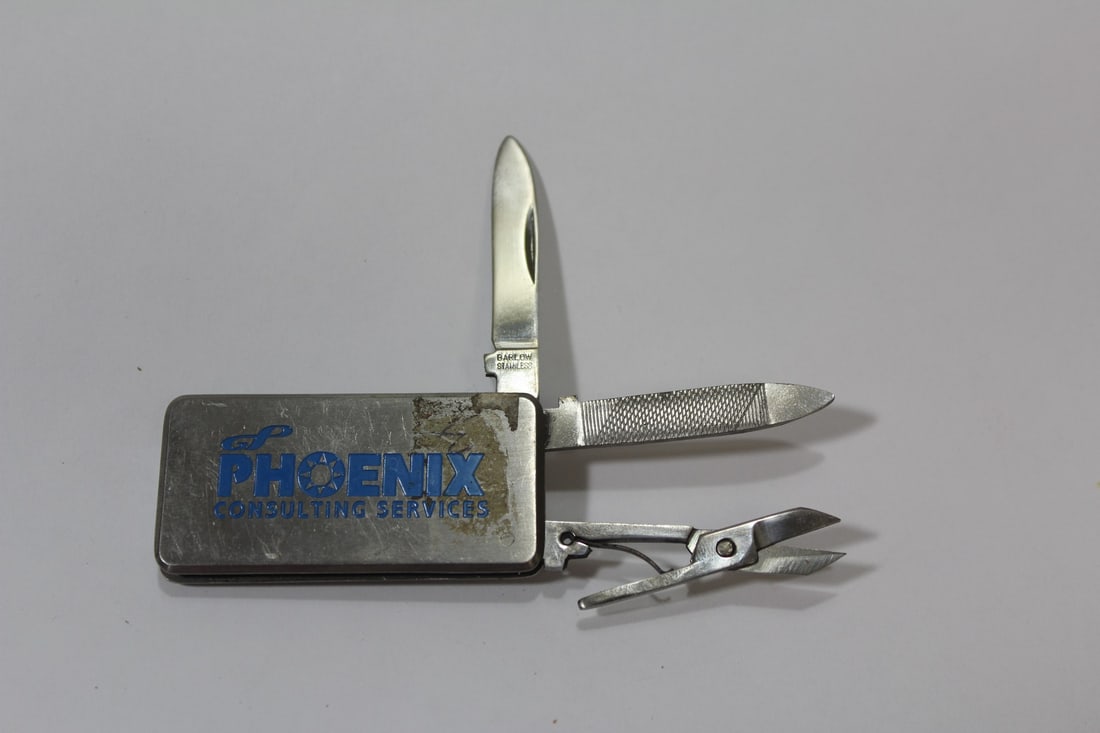 An Advertising Pocket Knife: and money clip etc combo