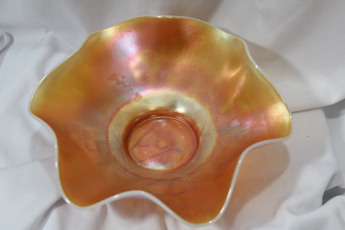 A Carnival Glass Bowl: 8 inches across