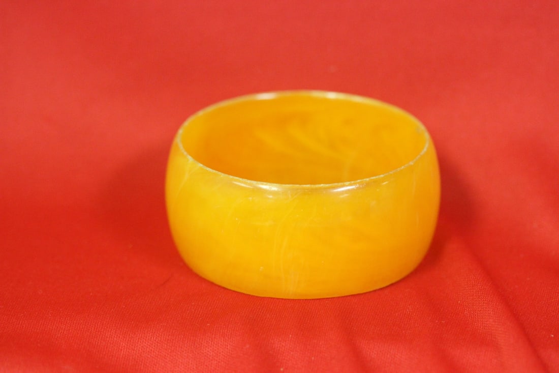 A Lucite? Bakelite? Bangle Bracelet: inside diameter: 2 1/2"