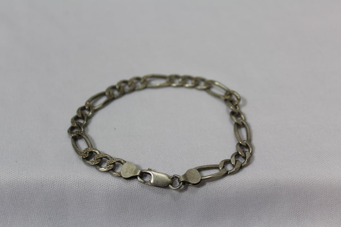 A Diamond Cut Bracelet: Sterling - 8" long unclasped