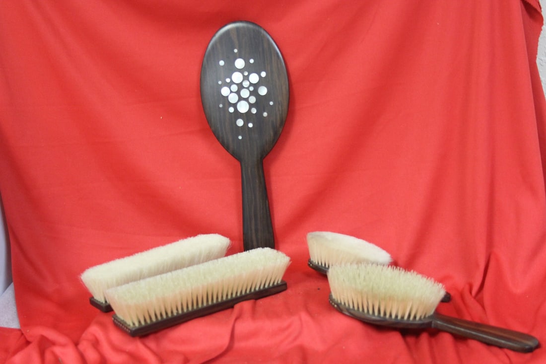 A Wood Inlay Victorian Vanity Set: 4 brushes and one mirror