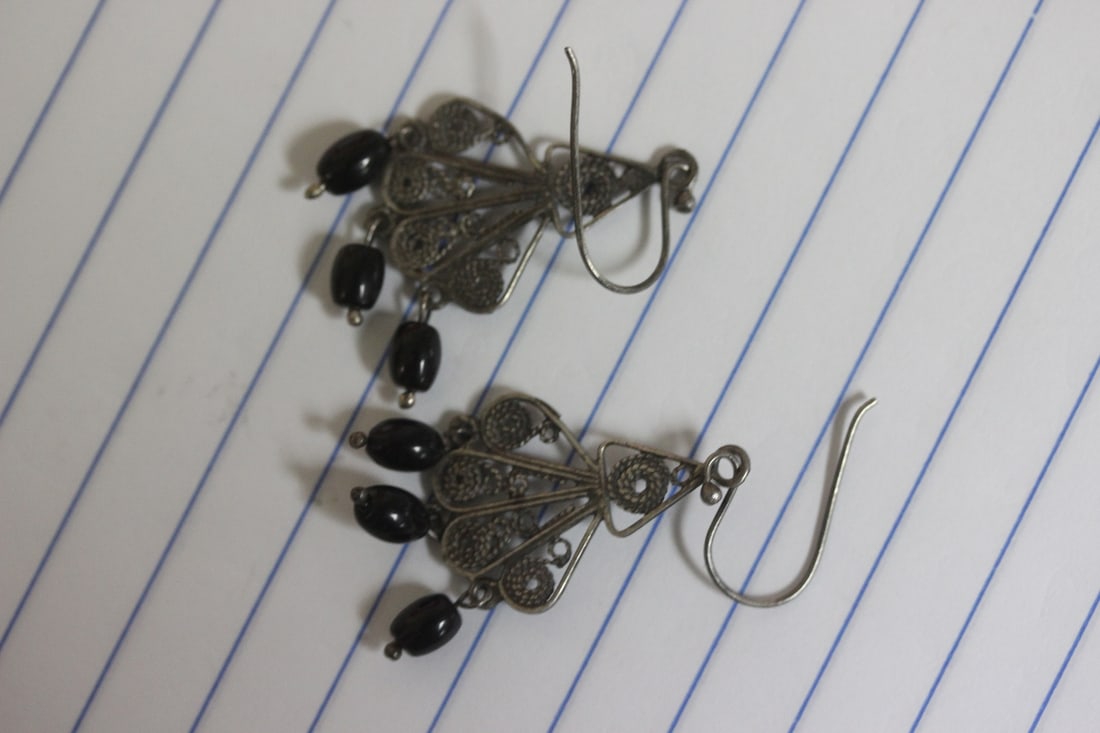 A Pair of Sterling Earrings: as shown