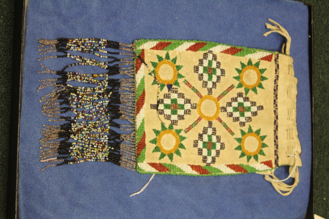Antique Native American Leather Beaded Purse: 9 1/2" H x 7 3/4" wide with an additional 5 inches of beaded fringes