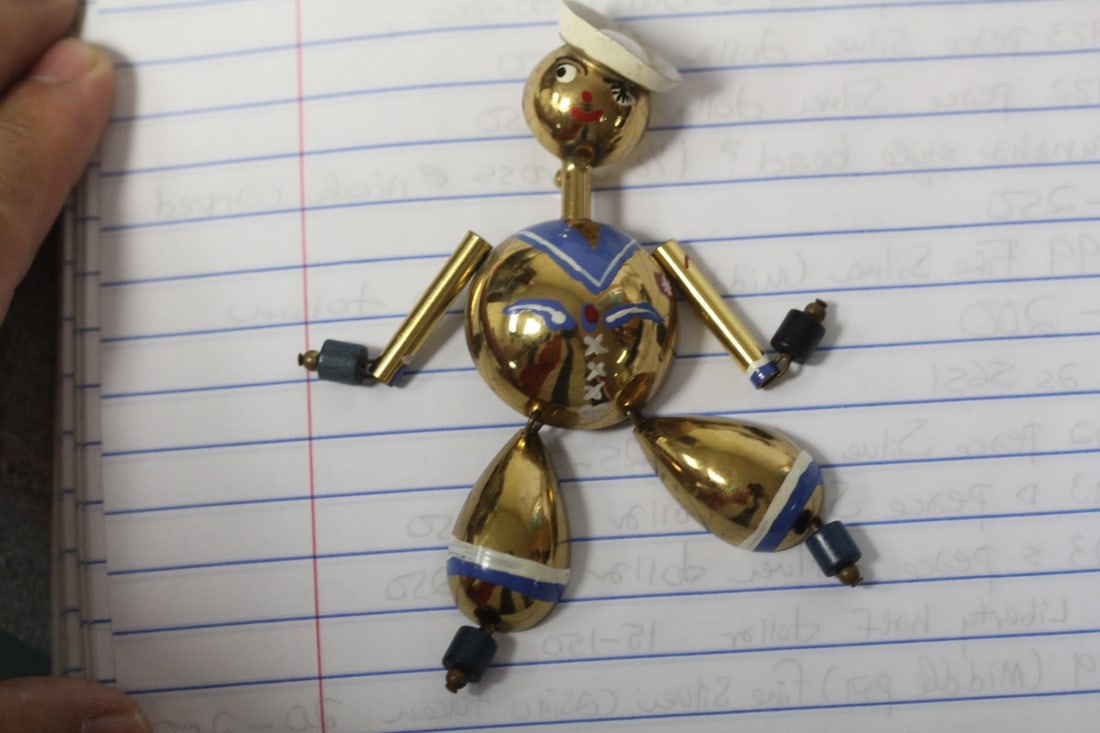 An Articulated Sailor Brooch: rare - larger size - metal construction