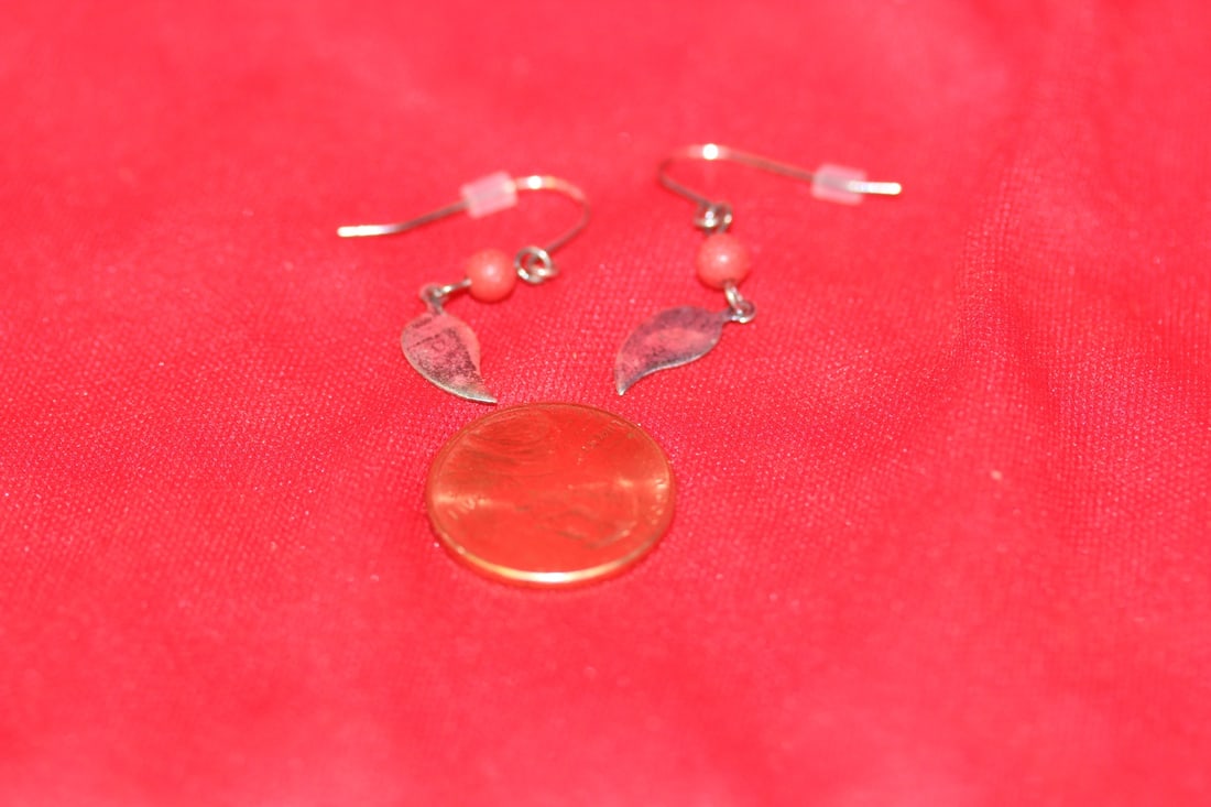 A Pair of Sterling Earrings: as shown