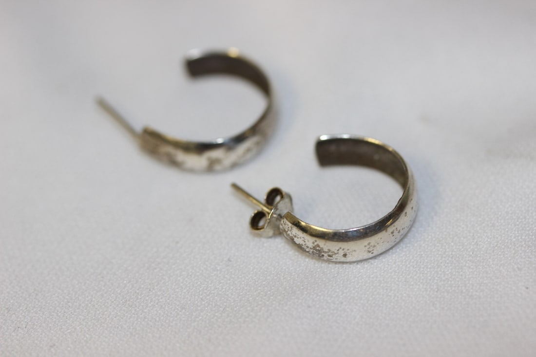 A Pair of Sterling Earrings: please note: one has no back