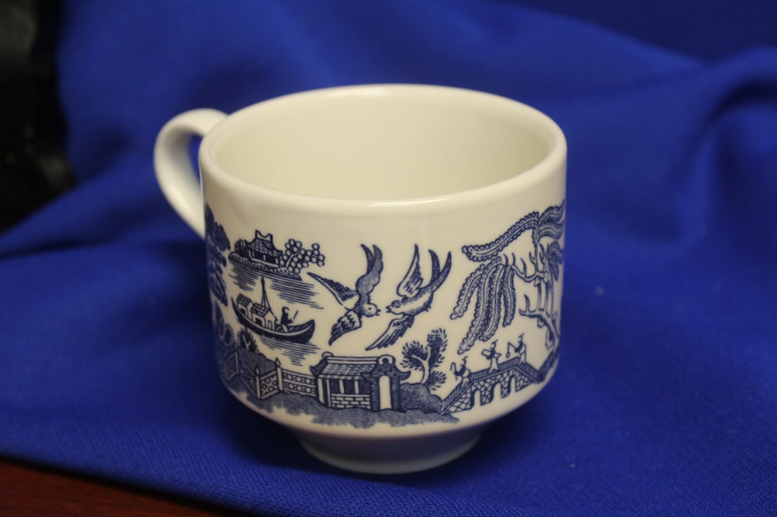 An English Blue and White Cup: 3 1/4" in diameter
