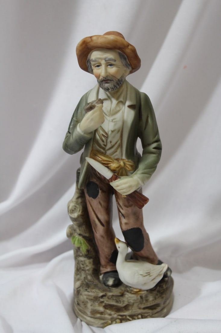 A Homco Figurine: 8 1/2" tall