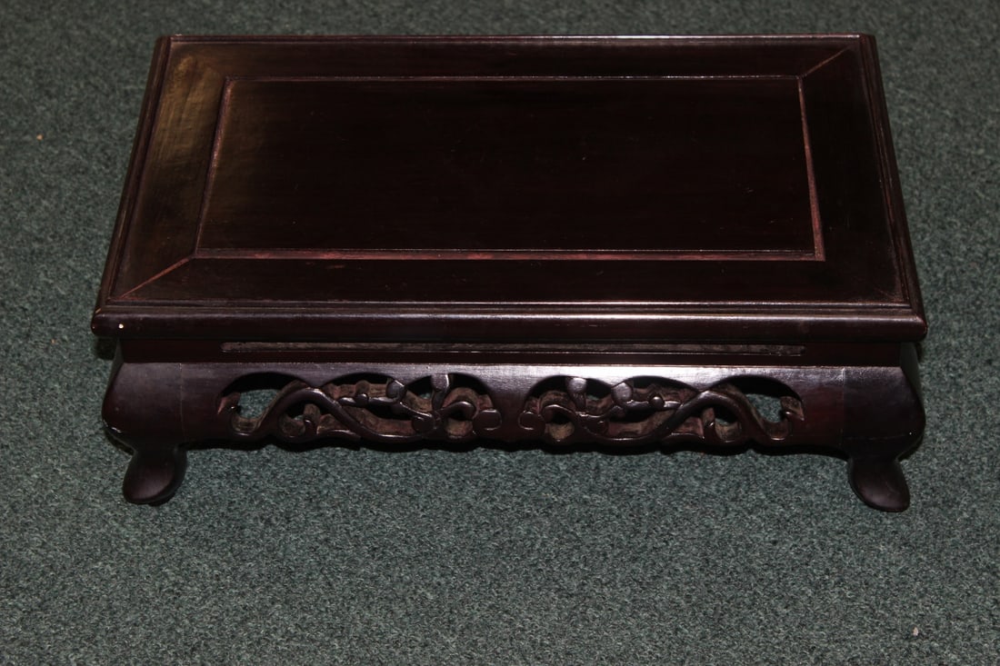 A Large Oriental Stand: Chinese - Hardwood - inside diameter= 15 3/4" x 9 1/4" - height= 5 5/8"