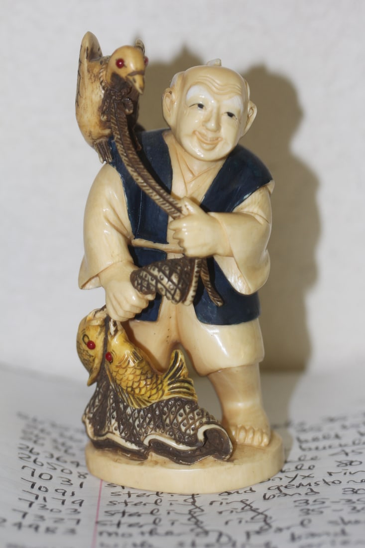 Antique Japanese Bone Figurine: okimono of a fisherman - very well carved - 4 1/2" tall