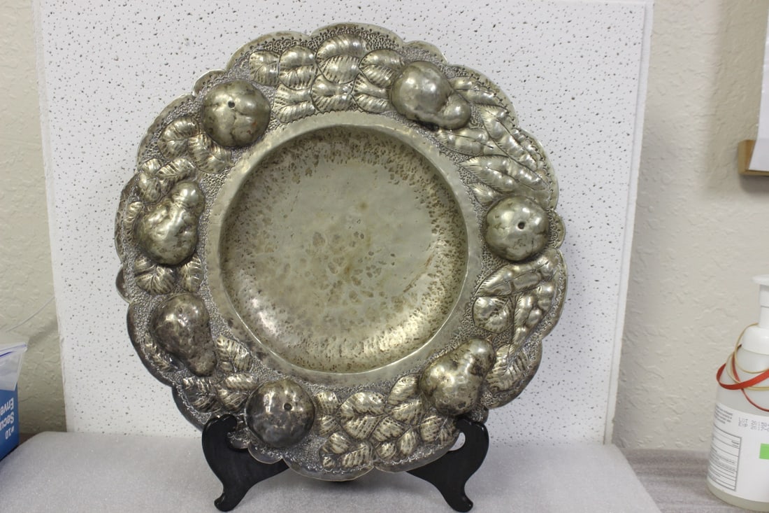 A Hand Hammered Tray: 16" in diameter